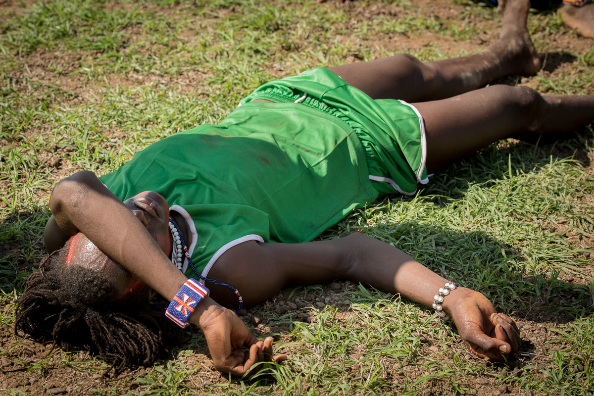 A warrior contestant collapses following his first heat. Following immediate attention and proper hydration, he is able to recover sufficiently to complete the competition.